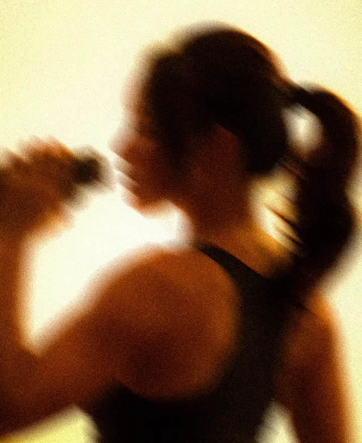 ASAI GYM: athlete drinking water after a workout